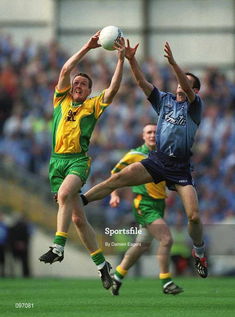 17 August 2002; Raymond Sweeney of Donegal in action against John McNally of Dublin during the Bank of Ireland All-Ireland Senior Football Championship Quarter-Final Replay match between Dublin and Donegal at Croke Park in Dublin. Photo by Damien Eagers/Sportsfile