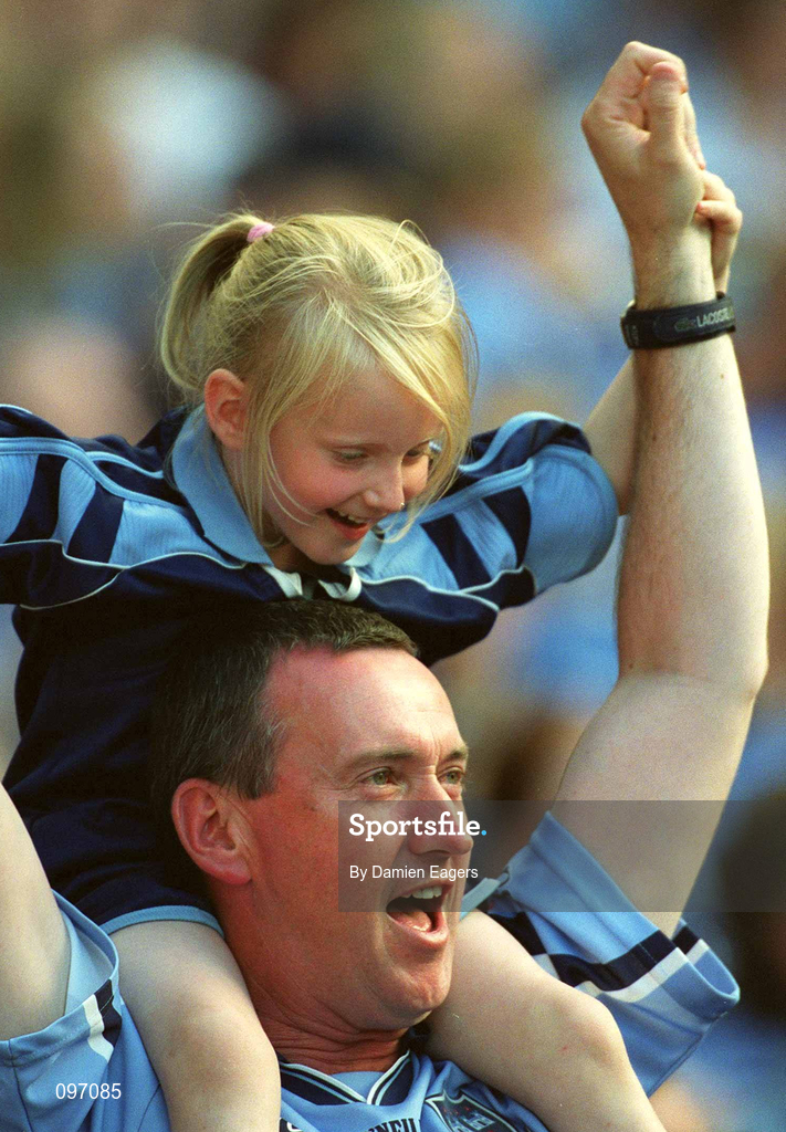 17 August 2002; Dublin supporters cheer on their team during the Bank of Ireland All-Ireland Senior Football Championship Quarter-Final Replay match between Dublin and Donegal at Croke Park in Dublin. Photo by Damien Eagers/Sportsfile
