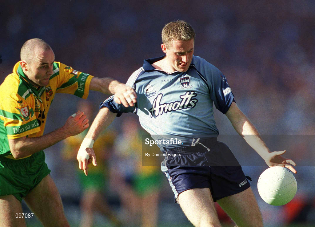 17 August 2002; Coman Goggins of Dublin is tackled by Kevin Cassidy of Donegal during the Bank of Ireland All-Ireland Senior Football Championship Quarter-Final Replay match between Dublin and Donegal at Croke Park in Dublin. Photo by Damien Eagers/Sportsfile