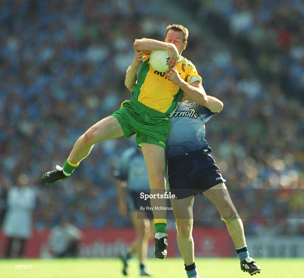 17 August 2002; Raymond Sweeney of Donegal in action against Dessie Farrell of during the Bank of Ireland All-Ireland Senior Football Championship Quarter-Final Replay match between Dublin and Donegal at Croke Park in Dublin. Photo by Ray McManus/Sportsfile