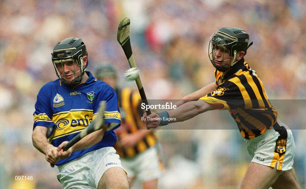 18 August 2002; Eoin Kelly of Tipperary in action against JJ Delaney of Kilkenny during the Guinness All-Ireland Senior Hurling Championship Semi-Final match between Kilkenny and Tipperary at Croke Park in Dublin. Photo by Damien Eagers/Sportsfile