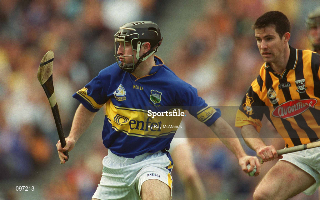 18 August 2002; Eoin Kelly of Tipperary in action against Philip Larkin of Kilkenny during the Guinness All-Ireland Senior Hurling Championship Semi-Final match between Kilkenny and Tipperary at Croke Park in Dublin. Photo by Ray McManus/Sportsfile