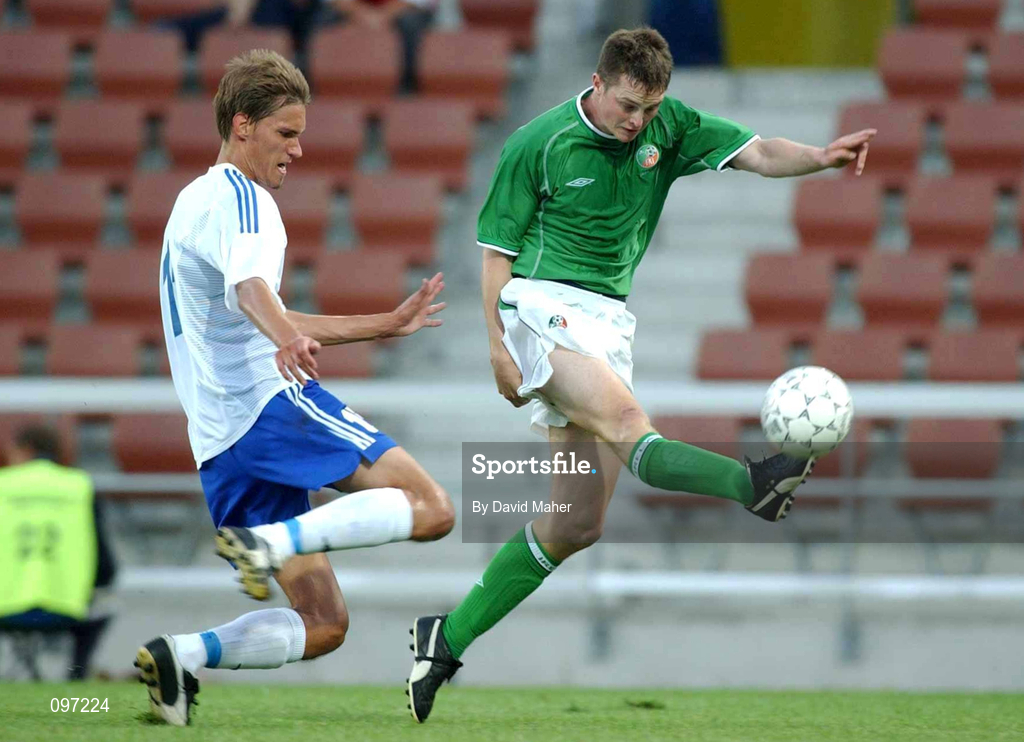 20 August 2002; Jonathan Daly of Republic of Ireland gets past Harri Haapaniemi of Finland to score a goal for his side during the U21 International Friendly match between Finland and Republic of Ireland at Finnair Stadium in Helsinki, Finland. Photo by David Maher/Sportsfile