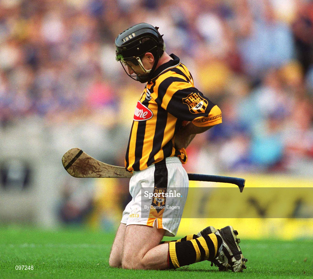 18 August 2002; DJ Carey of Kilkenny holds his back after an off the ball incident during the Guinness All-Ireland Senior Hurling Championship Semi-Final match between Kilkenny and Tipperary at Croke Park in Dublin. Photo by Damien Eagers/Sportsfile