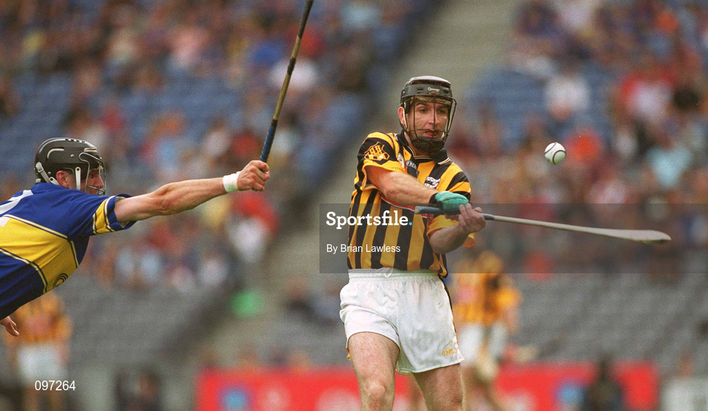 18 August 2002; DJ Carey of Kilkenny in action against Thomas Costello of Tipperary during the Guinness All-Ireland Senior Hurling Championship Semi-Final match between Kilkenny and Tipperary at Croke Park in Dublin. Photo by Brian Lawless/Sportsfile