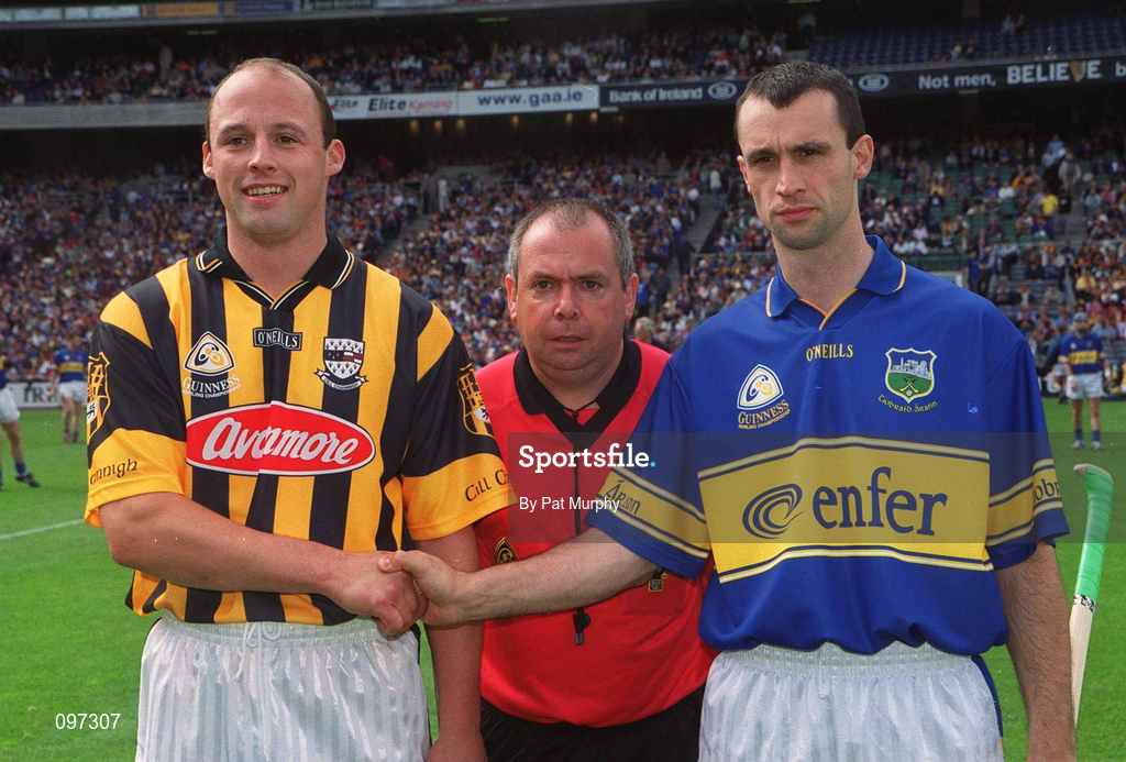 18 August 2002; Referee Aodán Mac Suibhne with team captains Andy Comerford of Kilkenny and Thomas Dunne of Tipperary prior to the Guinness All-Ireland Senior Hurling Championship Semi-Final match between Kilkenny and Tipperary at Croke Park in Dublin. Photo by Pat Murphy/Sportsfile
