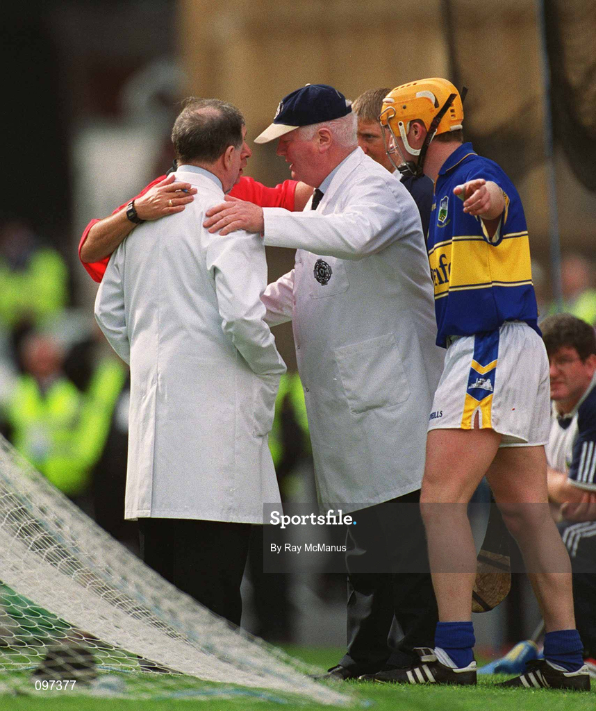 18 August 2002; Referee Aodán Mac Suibhne consults with his umpires before awarding Kilkenny a point during the Guinness All-Ireland Senior Hurling Championship Semi-Final match between Kilkenny and Tipperary at Croke Park in Dublin. Photo by Ray McManus/Sportsfile