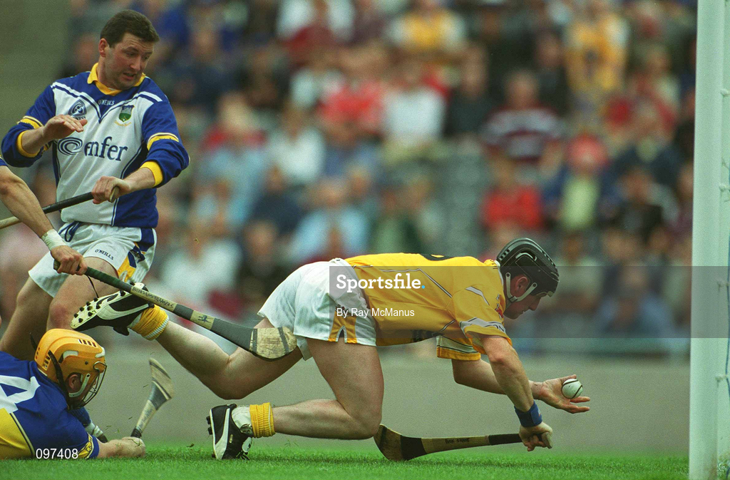 28 July 2002; Gregory O'Kane of Antrim goes past Tipperary goalkeeper Brendan Cummins to score a goal which was subsequently disallowed during the All-Ireland Senior Hurling Championship Quarter-Final match between Antrim and Tipperary at Croke Park in Dublin. Photo by Ray McManus/Sportsfile
