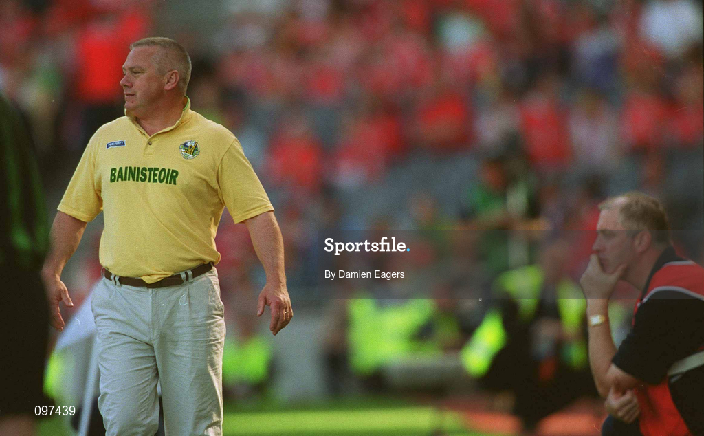 25 August 2002; Kerry manager Páidí Ó Sé walks up the sideline as Cork manager Larry Tompkins looks on during the Bank of Ireland All-Ireland Senior Football Championship Semi-Final match between Kerry and Cork at Croke Park in Dublin. Photo by Damien Eagers/Sportsfile
