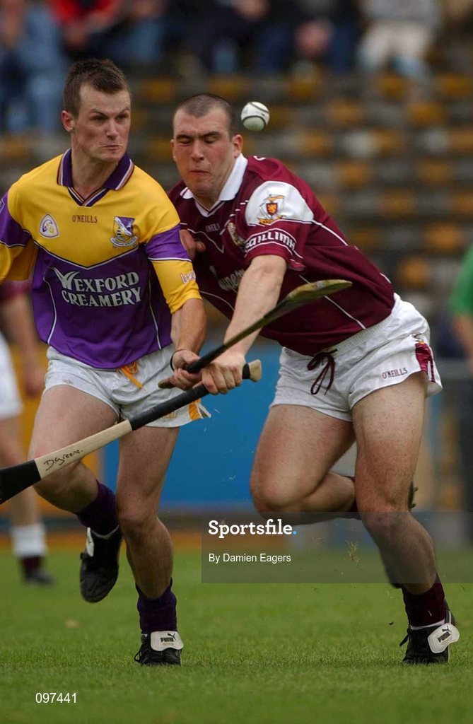 24 August 2002; Darren Stamp of Wexford in action against David Green of Galway during the All-Ireland U21 Hurling Championship Semi-Final match between Galway and Wexford at Semple Stadium in Thurles, Tipperary. Photo by Damien Eagers/Sportsfile