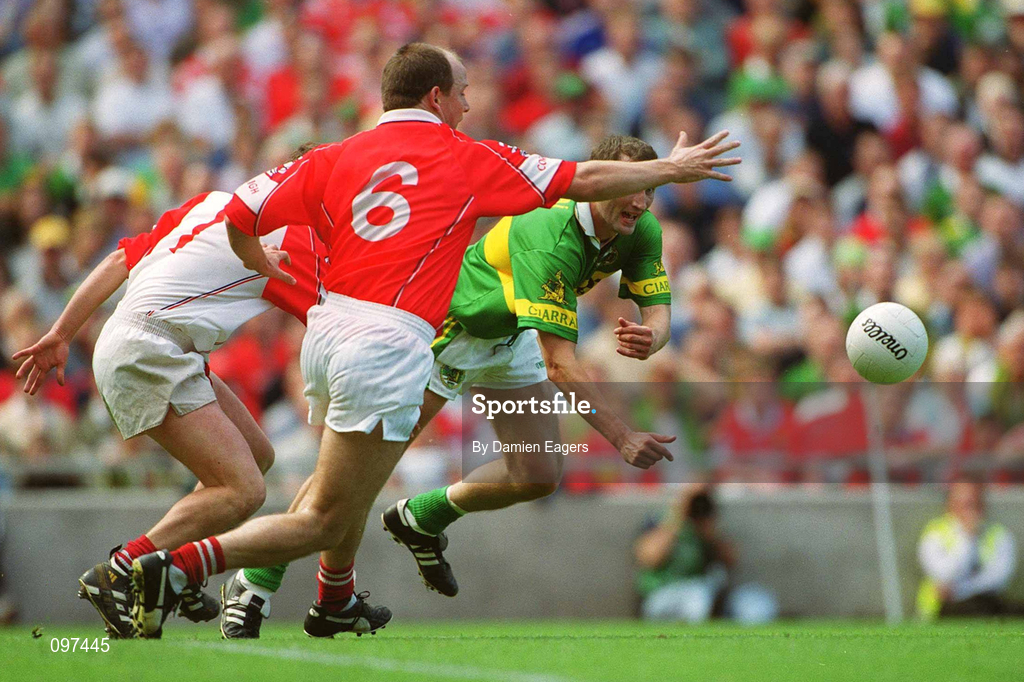 25 August 2002; Donal Daly of Kerry in action against Ronan McCarthy, 6, and Kevin O'Dwyer of Cork during the Bank of Ireland All-Ireland Senior Football Championship Semi-Final match between Kerry and Cork at Croke Park in Dublin. Photo by Damien Eagers/Sportsfile