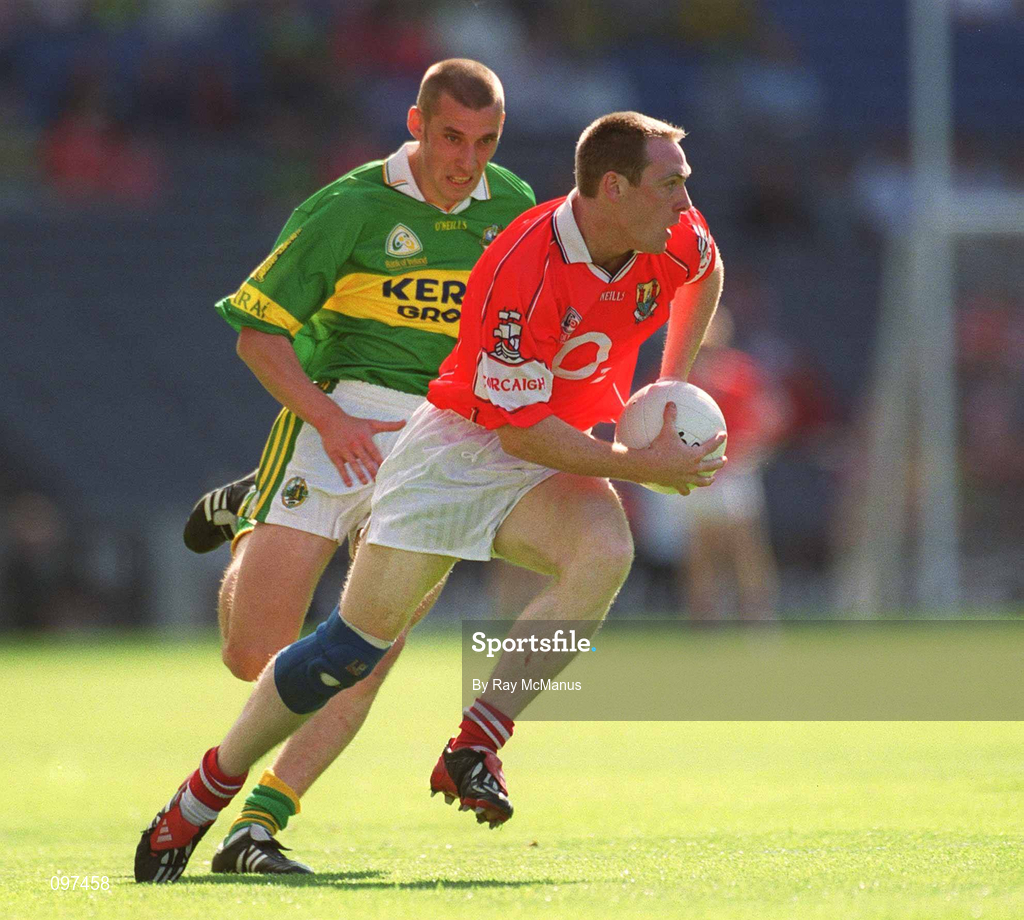 25 August 2002; Philip Clifford of Cork in action against Sean O'Sullivan of Kerry during the Bank of Ireland All-Ireland Senior Football Championship Semi-Final match between Kerry and Cork at Croke Park in Dublin. Photo by Ray McManus/Sportsfile