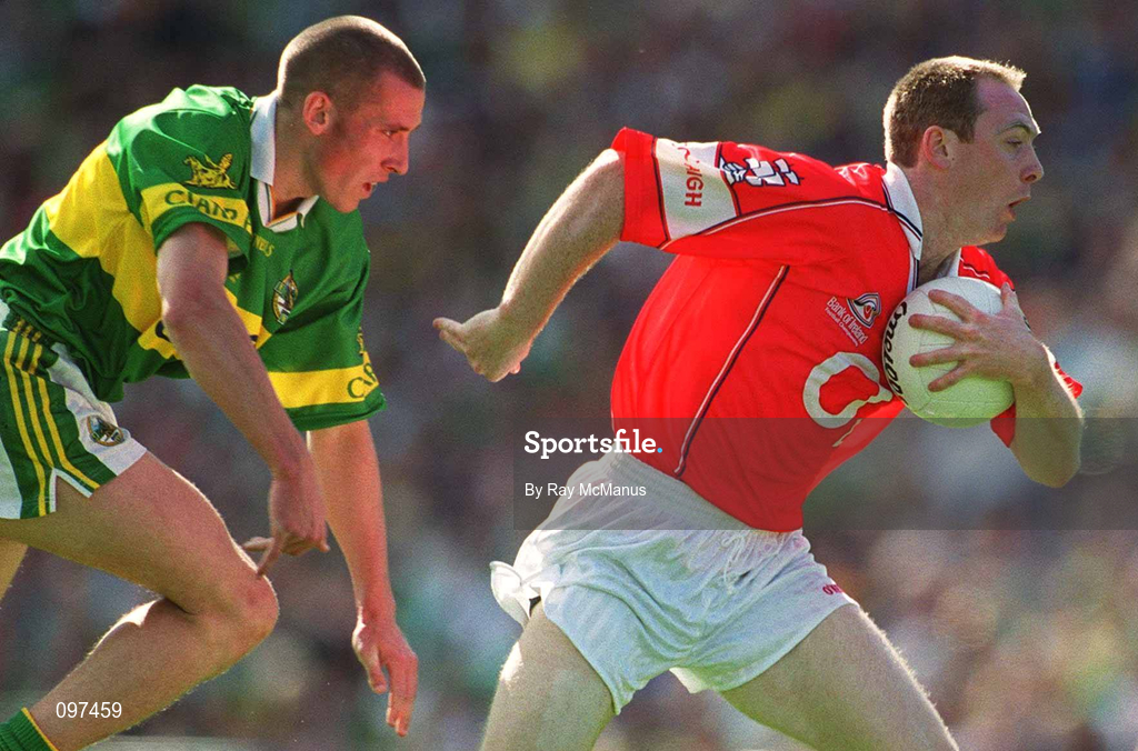 25 August 2002; Philip Clifford of Cork in action against Seán O'Sullivan of Kerry during the Bank of Ireland All-Ireland Senior Football Championship Semi-Final match between Kerry and Cork at Croke Park in Dublin. Photo by Ray McManus/Sportsfile