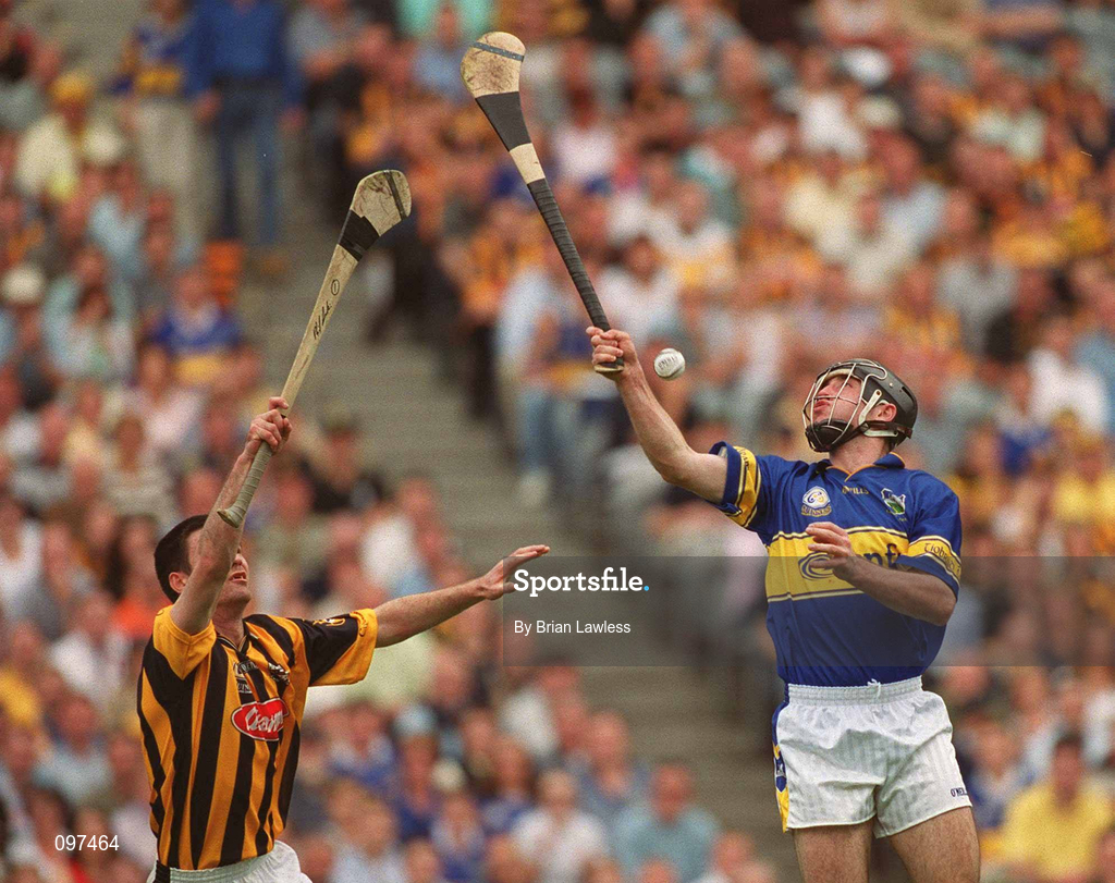 18 August 2002; Eoin Kelly of Tipperary in action against Philip Larkin of Kilkenny during the Guinness All-Ireland Senior Hurling Championship Semi-Final match between Kilkenny and Tipperary at Croke Park in Dublin. Photo by Brian Lawless/Sportsfile