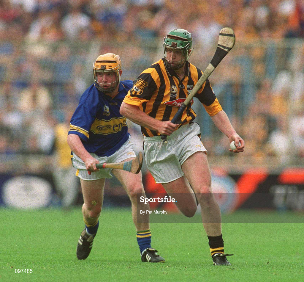 18 August 2002; Henry Shefflin of Kilkenny in action against Eamonn Corcoran of Tipperary during the Guinness All-Ireland Senior Hurling Championship Semi-Final match between Kilkenny and Tipperary at Croke Park in Dublin. Photo by Pat Murphy/Sportsfile