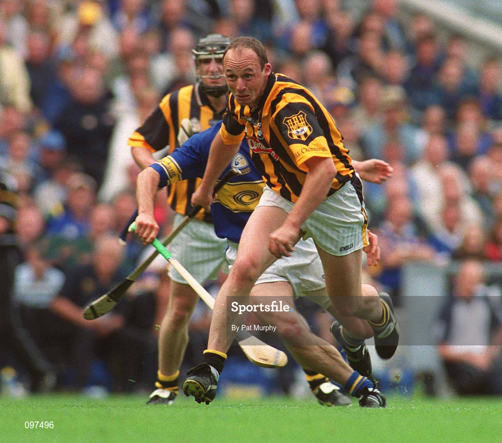 18 August 2002; Andy Comerford of Kilkenny in action against Eddie Enright of Tipperary during the Guinness All-Ireland Senior Hurling Championship Semi-Final match between Kilkenny and Tipperary at Croke Park in Dublin. Photo by Pat Murphy/Sportsfile