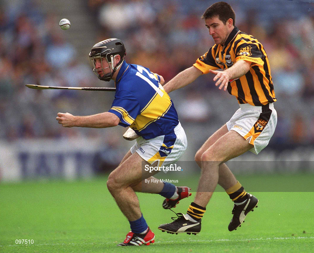 18 August 2002; Eoin Kelly of Tipperary in action against Philip Larkin of Kilkenny during the Guinness All-Ireland Senior Hurling Championship Semi-Final match between Kilkenny and Tipperary at Croke Park in Dublin. Photo by Ray McManus/Sportsfile