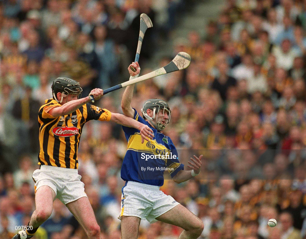 18 August 2002; Martin Comerford of Kilkenny in action against Thomas Costello of Tipperary during the Guinness All-Ireland Senior Hurling Championship Semi-Final match between Kilkenny and Tipperary at Croke Park in Dublin. Photo by Ray McManus/Sportsfile