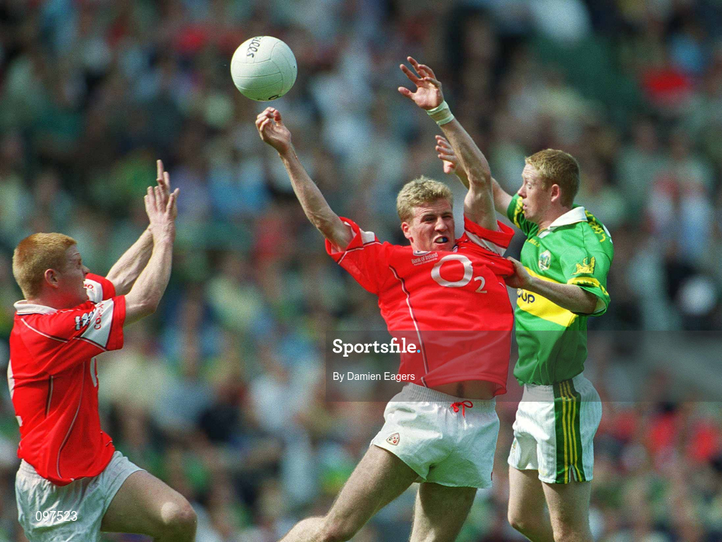 25 August 2002; Anthony Lynch of Cork, supported by team-mate Seán Levis, left, in action against Colm Cooper of Kerry during the Bank of Ireland All-Ireland Senior Football Championship Semi-Final match between Kerry and Cork at Croke Park in Dublin. Photo by Damien Eagers/Sportsfile