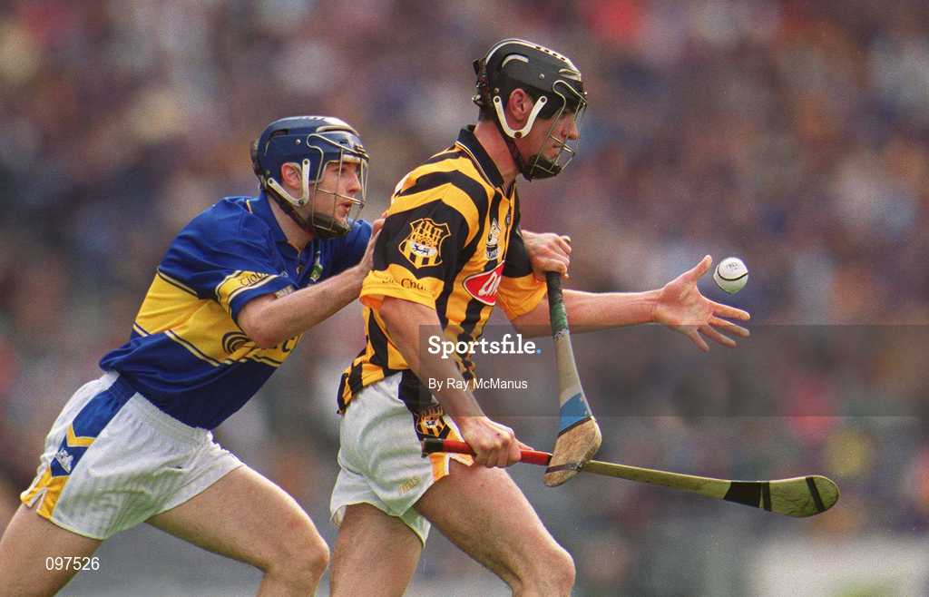 18 August 2002; John Hoyne of Kilkenny in action against Paul Kelly of Tipperary during the Guinness All-Ireland Senior Hurling Championship Semi-Final match between Kilkenny and Tipperary at Croke Park in Dublin. Photo by Ray McManus/Sportsfile