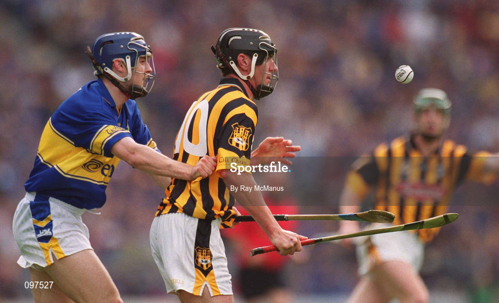 18 August 2002; John Hoyne of Kilkenny in action against Paul Kelly of Tipperary during the Guinness All-Ireland Senior Hurling Championship Semi-Final match between Kilkenny and Tipperary at Croke Park in Dublin. Photo by Ray McManus/Sportsfile