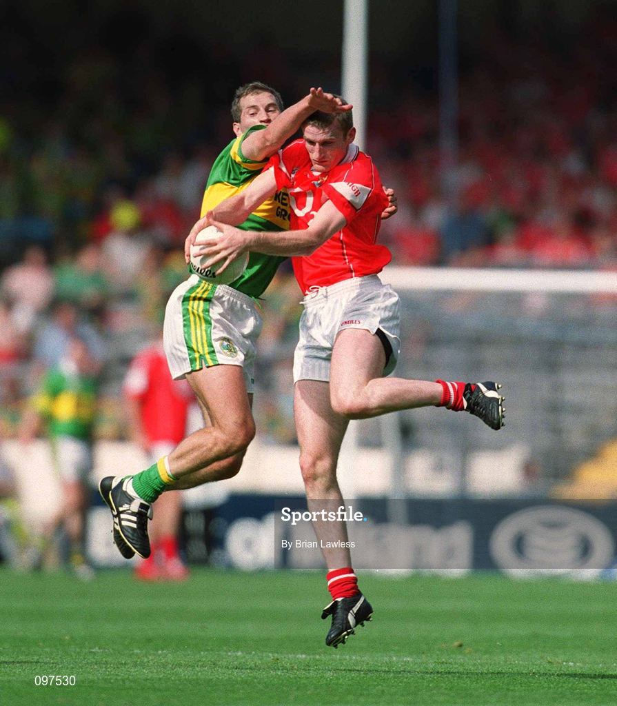 25 August 2002; Nicholas Murphy of Cork in action against Donal Daly of Kerry during the Bank of Ireland All-Ireland Senior Football Championship Semi-Final match between Kerry and Cork at Croke Park in Dublin. Photo by Brian Lawless/Sportsfile