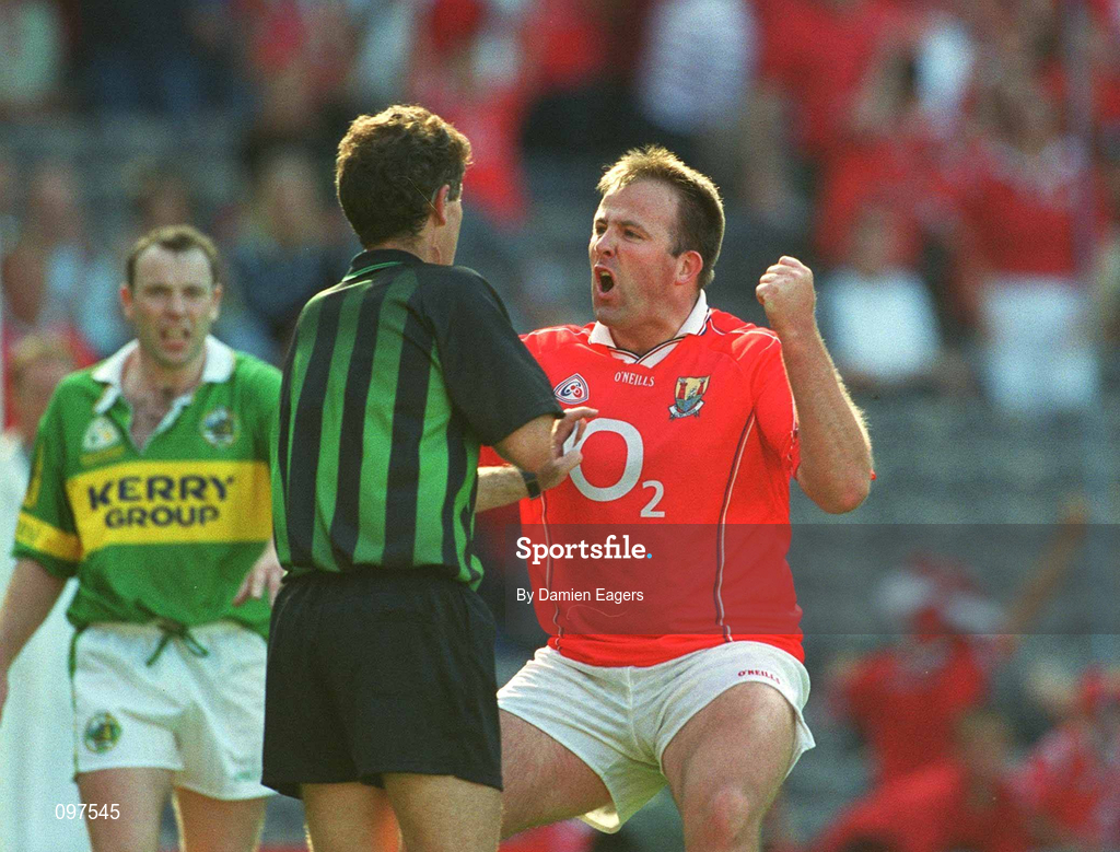 25 August 2002; Cork captain Colin Corkery remonstrates with referee Brian White, after White had disallowed Corkery's quick free goal, during the Bank of Ireland All-Ireland Senior Football Championship Semi-Final match between Kerry and Cork at Croke Park in Dublin. Photo by Damien Eagers/Sportsfile