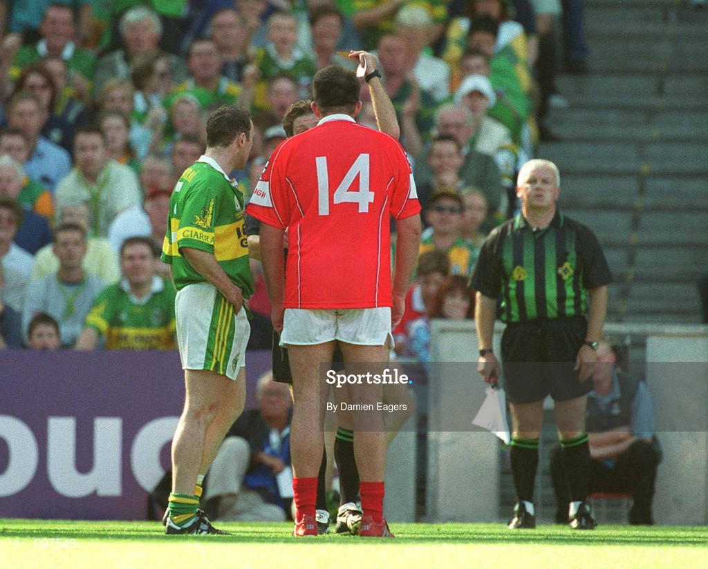 25 August 2002; Colin Corkery of Cork is shown a second yellow card by referee Brian White, before being sent off, as Séamus Moynihan of Kerry looks on during the Bank of Ireland All-Ireland Senior Football Championship Semi-Final match between Kerry and Cork at Croke Park in Dublin. Photo by Damien Eagers/Sportsfile