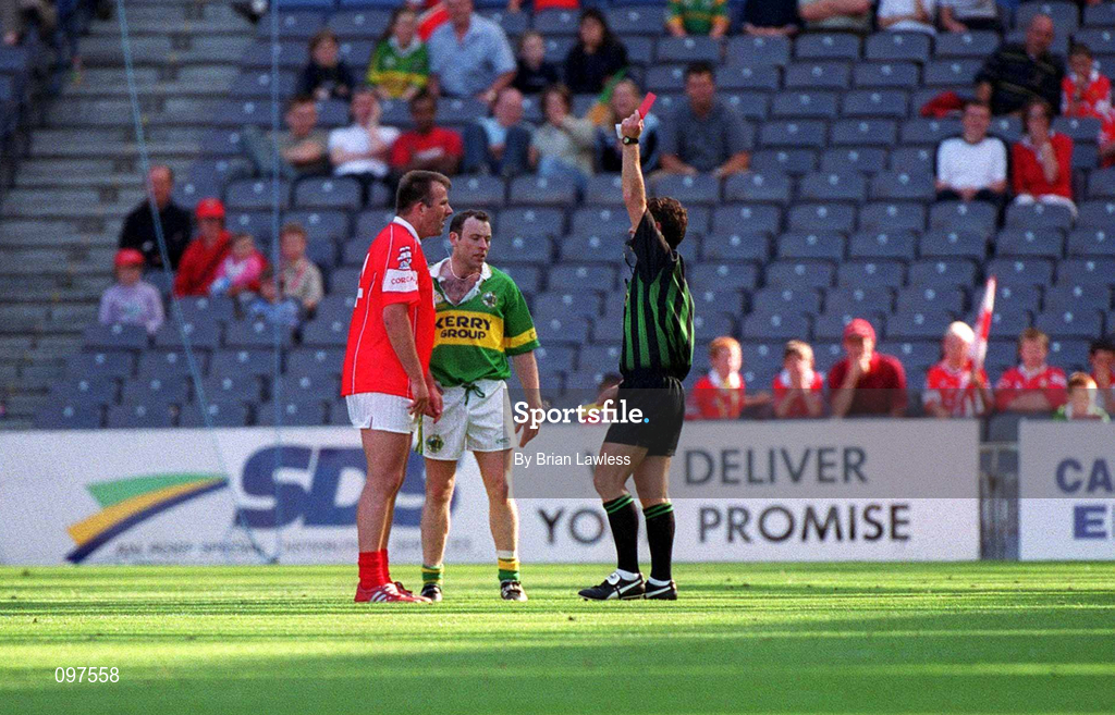 25 August 2002; Colin Corkery of Cork is shown the red card by referee Brian White, as Séamus Moynihan of Kerry looks on during the Bank of Ireland All-Ireland Senior Football Championship Semi-Final match between Kerry and Cork at Croke Park in Dublin. Photo by Brian Lawless/Sportsfile