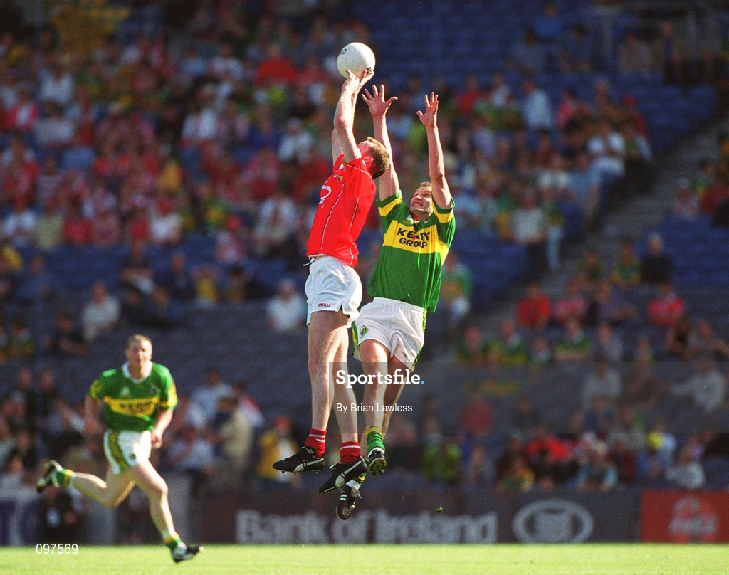25 August 2002; Nicholas Murphy of Cork in action against Donal Daly of Kerry during the Bank of Ireland All-Ireland Senior Football Championship Semi-Final match between Kerry and Cork at Croke Park in Dublin. Photo by Brian Lawless/Sportsfile