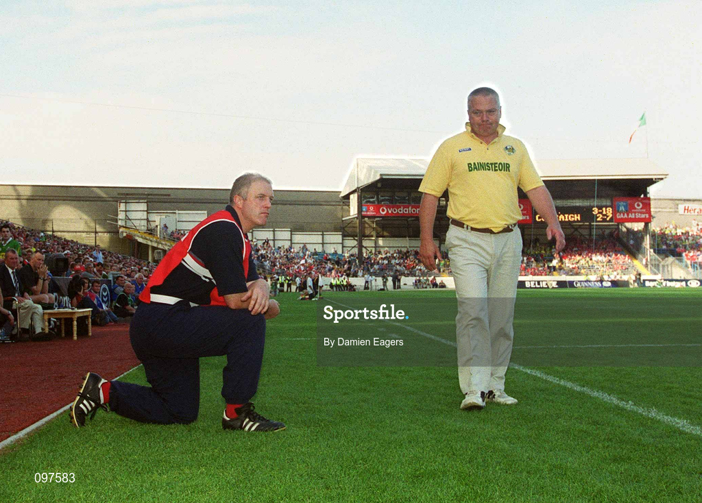 25 August 2002; Cork manager Larry Tompkins and Kerry manager Páidí Ó Sé watch the closing stages of the Bank of Ireland All-Ireland Senior Football Championship Semi-Final match between Kerry and Cork at Croke Park in Dublin. Photo by Damien Eagers/Sportsfile