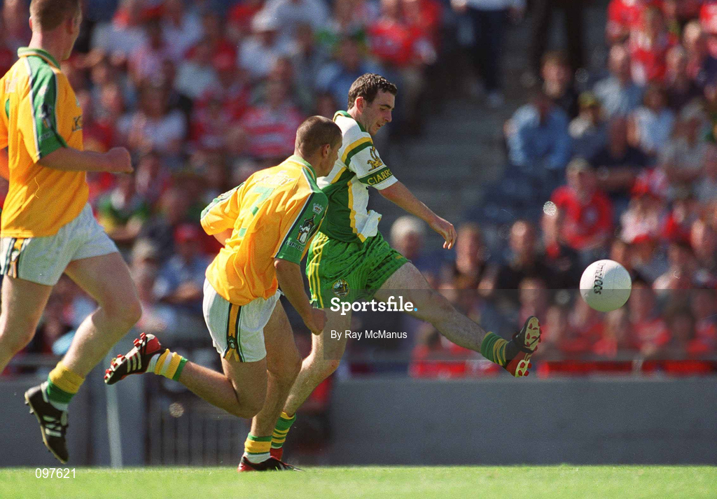 25 August 2002; Colm O'Connor of Kerry shoots under pressure from Thomas O'Connor of Meath during the All-Ireland Minor Football Championship Semi-Final match between Meath and Kerry at Croke Park in Dublin. Photo by Ray McManus/Sportsfile