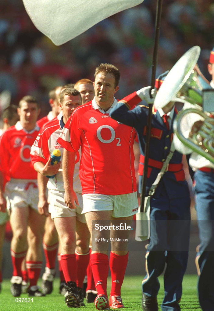 25 August 2002; Cork captain Colin Corkery leads his team in the parade prior to the Bank of Ireland All-Ireland Senior Football Championship Semi-Final match between Kerry and Cork at Croke Park in Dublin. Photo by Ray McManus/Sportsfile