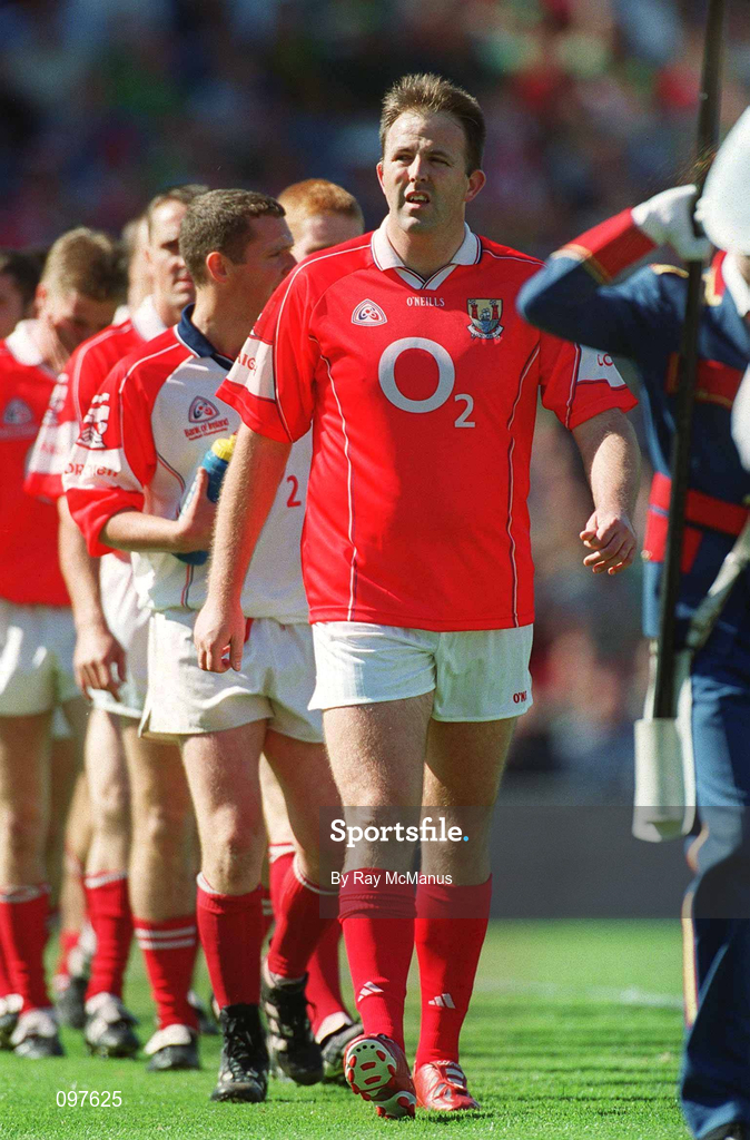 25 August 2002; Cork captain Colin Corkery leads his team during the parade prior to the Bank of Ireland All-Ireland Senior Football Championship Semi-Final match between Kerry and Cork at Croke Park in Dublin. Photo by Ray McManus/Sportsfile