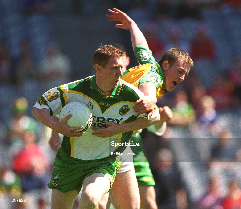 25 August 2002; John Martin Clifford of Kerry in action against Joe Sheridan of Meath during the All-Ireland Minor Football Championship Semi-Final match between Meath and Kerry at Croke Park in Dublin. Photo by Brian Lawless/Sportsfile