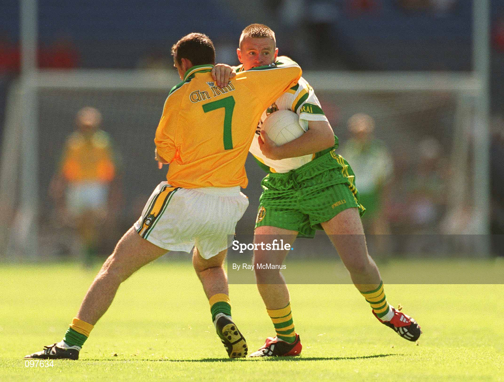 25 August 2002; Michael Cronin of Kerry in action against Eoin Dunne of Meath during the All-Ireland Minor Football Championship Semi-Final match between Meath and Kerry at Croke Park in Dublin. Photo by Ray McManus/Sportsfile