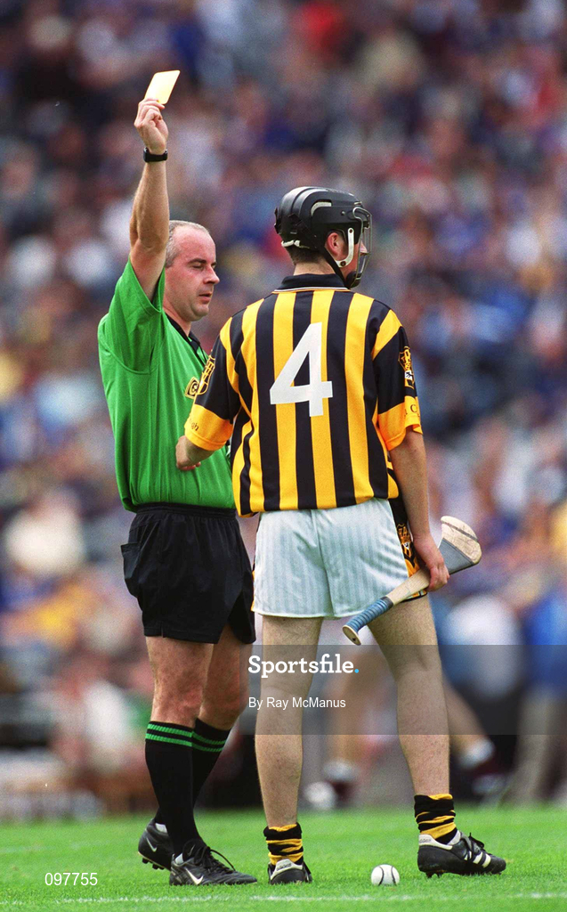 18 August 2002; Referee John Sexton shows the yellow card to David Prendergast of Kilkenny during the All-Ireland Minor Hurling Championship Semi-Final match between Kilkenny and Galway at Croke Park in Dublin. Photo by Ray McManus/Sportsfile