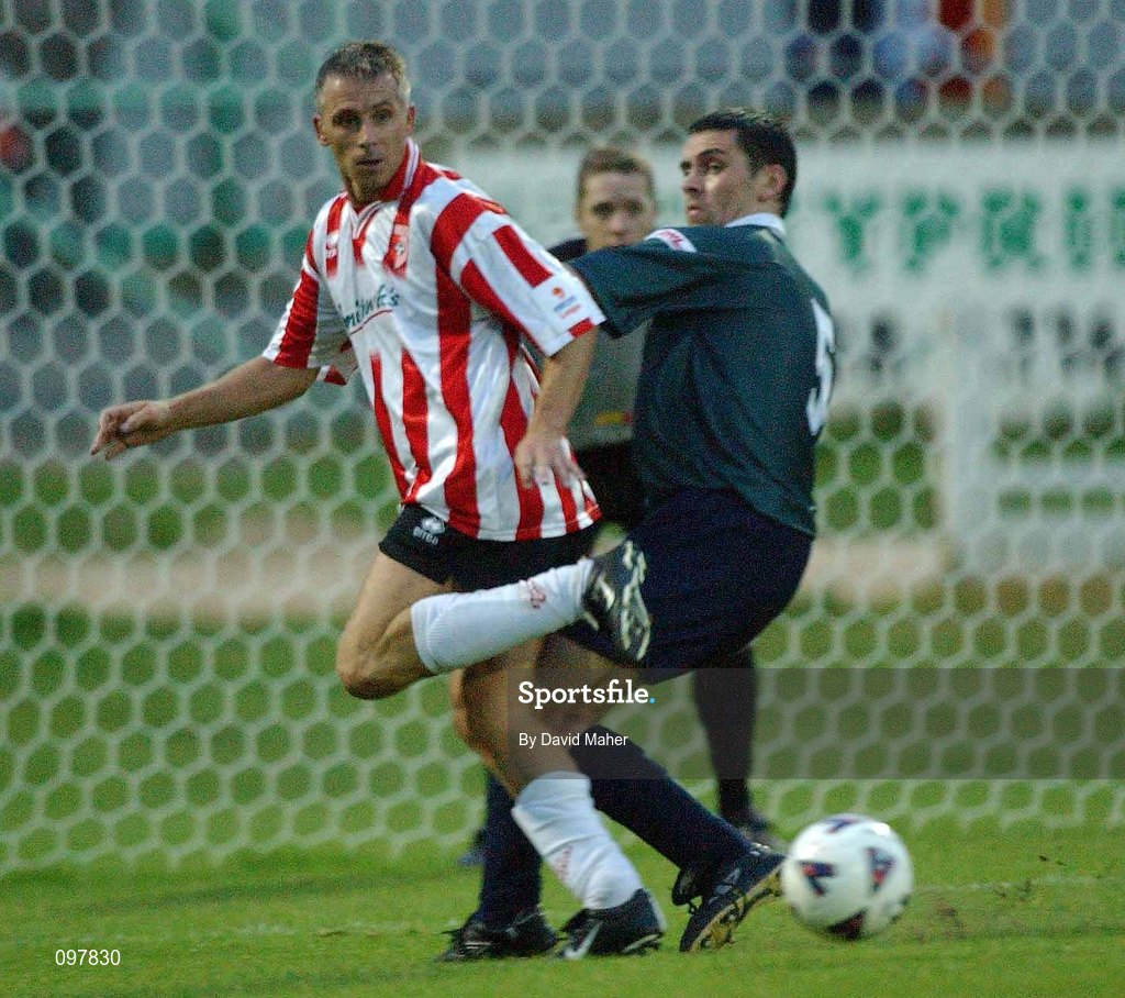 29 August 2002; David Kelly of Derry City in action against Darragh McGuire of St Patrick's Athletic eircom League Premier Division match between Derry City and St Patrick's Athletic at the Brandywell Stadium in Derry. Photo by David Maher/Sportsfile