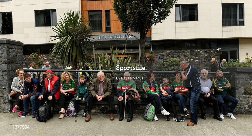 26 August 2017; Supporters of both teams sit and chat, outside The Croke Park Hotel, before the GAA Football All-Ireland Senior Championship Semi-Final Replay match between Kerry and Mayo at Croke Park in Dublin. Photo by Ray McManus/Sportsfile