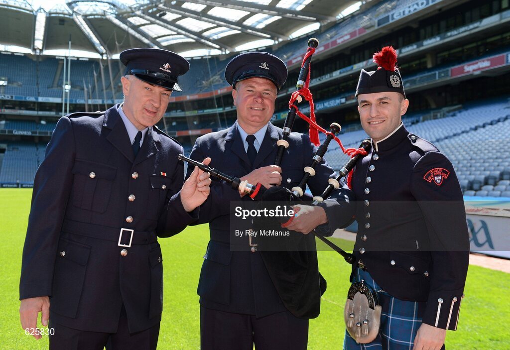 29 May 2012; In attendance at a Dublin Fire Brigade 150 year celebration photocall is DFB member and former Dublin All-Ireland medal winners Gerry Hargan, left,  Charlie Redmond and Piper Jonathon Forbes. Dublin Fire Brigade and many of their friends from Fire and Police departments across the United States have travelled to Dublin to perform with them throughout the weekend, culminating in a performance at Croke Park for the Leinster GAA football senior championship 2012 Quarter-Finals. Croke Park, Dublin. Picture credit: Ray McManus / SPORTSFILE **