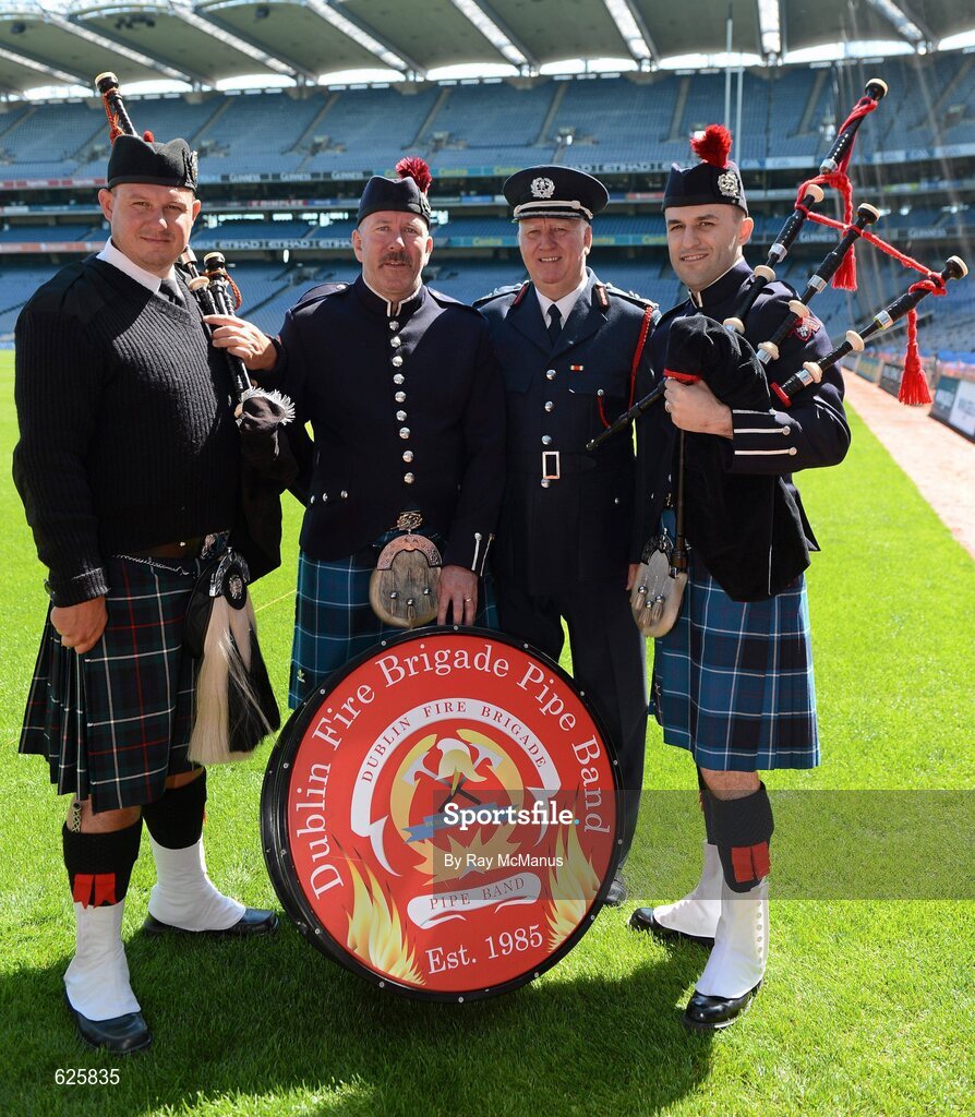 29 May 2012; In attendance at a Dublin Fire Brigade 150 year celebration photocall are Tim Zerr, Eugene Fire Pipes and Drums Band, Oregon, USA, left, John Daly, Chairman DFB Pipe Band, Chief Fire Officer Stephen Brady and Piper Jonathon Forbes. Dublin Fire Brigade and many of their friends from Fire and Police departments across the United States have travelled to Dublin to perform with them throughout the weekend, culminating in a performance at Croke Park for the Leinster GAA football senior championship 2012 quarter finals. Croke Park, Dublin. Picture credit: Ray McManus / SPORTSFILE