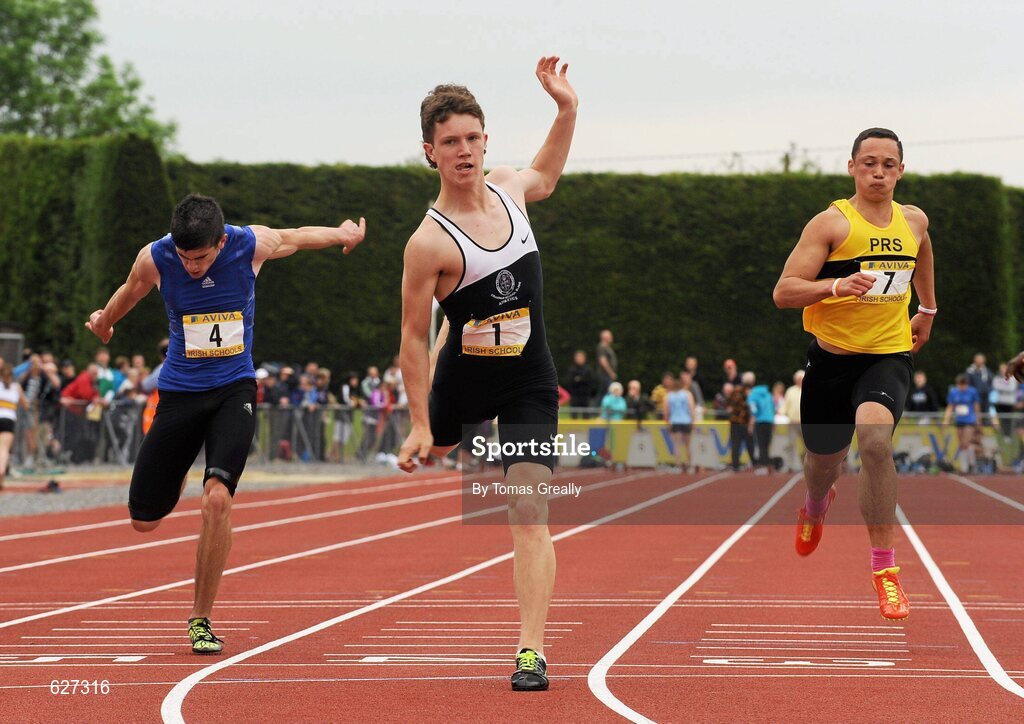 2 June 2012; Zak Irwin, centre, Sligo Grammer, Sligo, crosses the line to win the Intermediate Boys 100m event at the Aviva All Ireland Schools’ Track and Field Championships 2012. Tullamore Harriers AC, Tullamore, Co. Offaly. Picture credit: Tomas Greally / SPORTSFILE