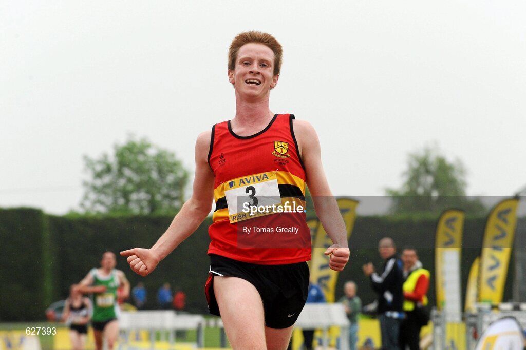 2 June 2012; Kevin Dooney, CBC Monkstown, Dublin, crosses the line to win the Senior Boys 5000m event at the Aviva All Ireland Schools’ Track and Field Championships 2012. Tullamore Harriers AC, Tullamore, Co. Offaly. Picture credit: Tomas Greally / SPORTSFILE