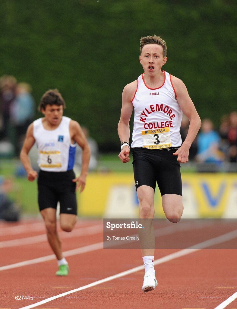 2 June 2012; Sean Lawlor, Kylemore College, Dublin, crosses the line to win the Junior Boys 200m event and set a new record of 23.16, at the Aviva All Ireland Schools’ Track and Field Championships 2012. Tullamore Harriers AC, Tullamore, Co. Offaly. Picture credit: Tomas Greally / SPORTSFILE *