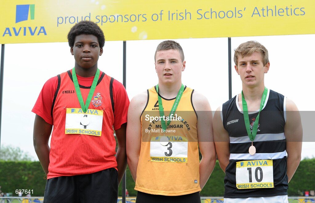 2 June 2012; Gold medal winner Eoin Sheridan, St Finian's College, Mullingar, Co. Westmeath, centre, with second place Anu Anonusi, left, from Kilkenny College, Co. Kilkenny, and third place Ethan Bannon, right, from, Belvedere College, Co. Dublin, after the Junior Boys Shot Putt at the Aviva All Ireland Schools’ Track and Field Championships 2012. Tullamore Harriers AC, Tullamore, Co. Offaly. Picture credit: Matt Browne / SPORTSFILE