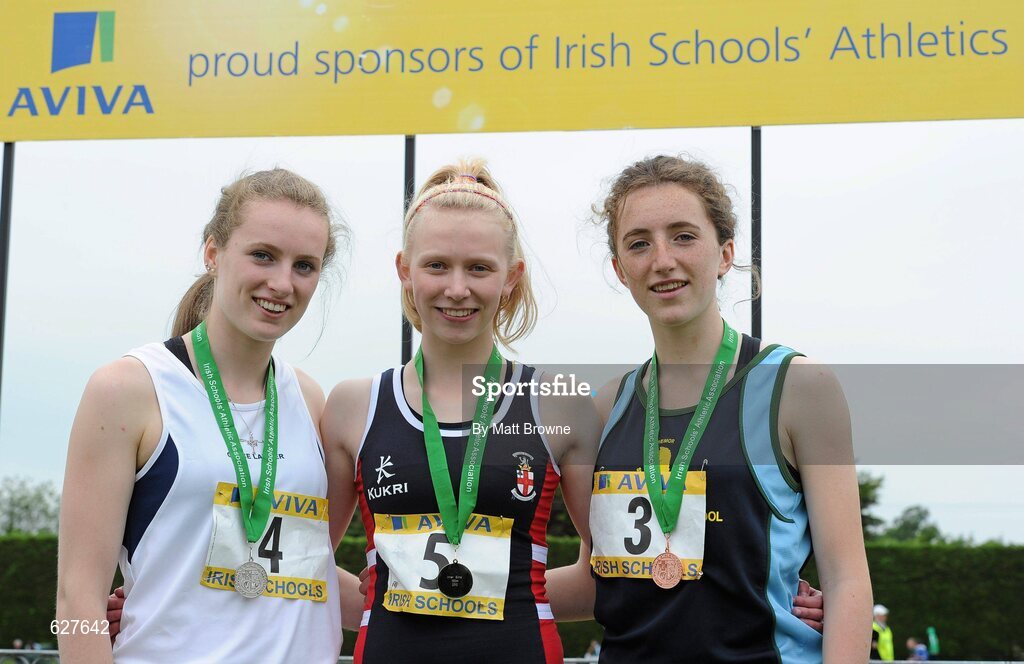 2 June 2012; Gold medal winner Roisin Harrison, centre, from Villiers School, Co. Limerick, with second place Grace Lawlor, left, from Presentation College, Co. Carlow, and third place Claire Foley, right, from, St Gerard's College, Bray, Co. Wicklow, after the Intermediate Girls 100m  at the Aviva All Ireland Schools’ Track and Field Championships 2012. Tullamore Harriers AC, Tullamore, Co. Offaly. Picture credit: Matt Browne / SPORTSFILE