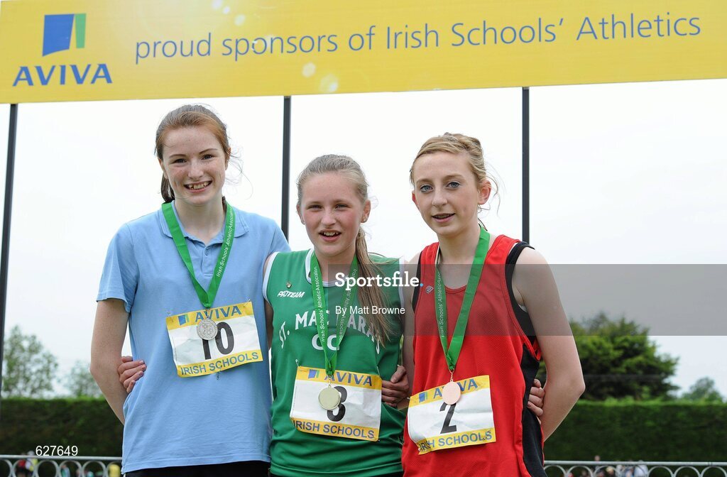 2 June 2012; Gold medal winner Carla Sweeney, centre, from St MacDara's Community College, Dublin, with second place Cassie Murphy, left, from Jesus and Mary College, Dublin, and third place Aisling Forkan, right, from, SM & P Swinford, Co. Mayo, after the Junior Girls 800m at the Aviva All Ireland Schools’ Track and Field Championships 2012. Tullamore Harriers AC, Tullamore, Co. Offaly. Picture credit: Matt Browne / SPORTSFILE