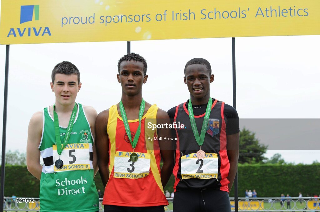 2 June 2012; Gold medal winner Mustafa Nasir, centre, from Greenhills College, Dublin, with second place Lucas O'hAragain, left, from Colaiste Chriost Ri Corcaigh, Co. Cork, and third place Samuel Samson, right, from, St Mary's, Galway, after the Junior Boys 800m at the Aviva All Ireland Schools’ Track and Field Championships 2012. Tullamore Harriers AC, Tullamore, Co. Offaly. Picture credit: Matt Browne / SPORTSFILE