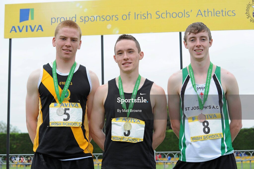 2 June 2012; Gold medal winner Tony Stafford, centre, from St Mary's CBS, New Ross, Co. Wexford, with second place Eoin O'Carroll, left, from Mercy Mount Hawk, Tralee, Co. Kerry, and third place Mark McGarvey, right, from, St Joseph's, Co. Derry, after the  Senior Boys Long Jump at the Aviva All Ireland Schools’ Track and Field Championships 2012. Tullamore Harriers AC, Tullamore, Co. Offaly. Picture credit: Matt Browne / SPORTSFILE