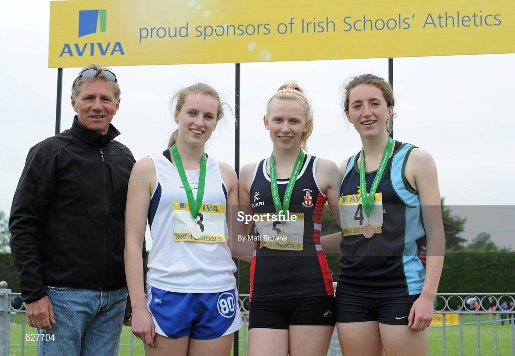 2 June 2012; Gold medal winner Roisin Harrison, centre, from Villiers School, Co. Limerick, with second place Grace Lawlor, left, from Presentation College, Carlow, third place Claire Foley, right, from, St Gerard's College, Co. Wicklow, and Senator Eamonn Coghlan after the Intermediate Girls 200m at the Aviva All Ireland Schools’ Track and Field Championships 2012. Tullamore Harriers AC, Tullamore, Co. Offaly. Picture credit: Matt Browne / SPORTSFILE